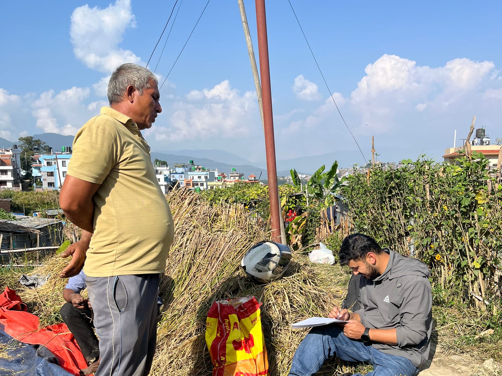 With a farmer in the field